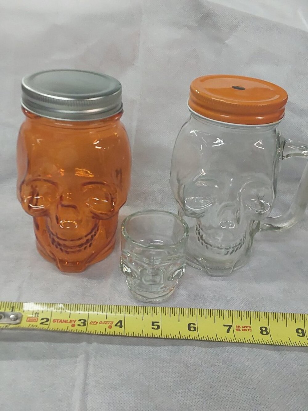 3 glass skull glasses jars with lids